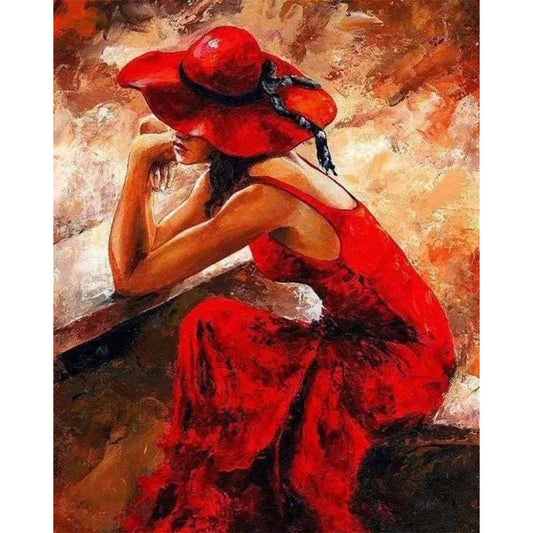 Woman wearing a Red Dress and Hat