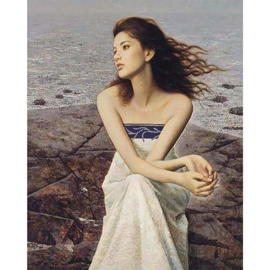 Woman on Rocks at the Beach