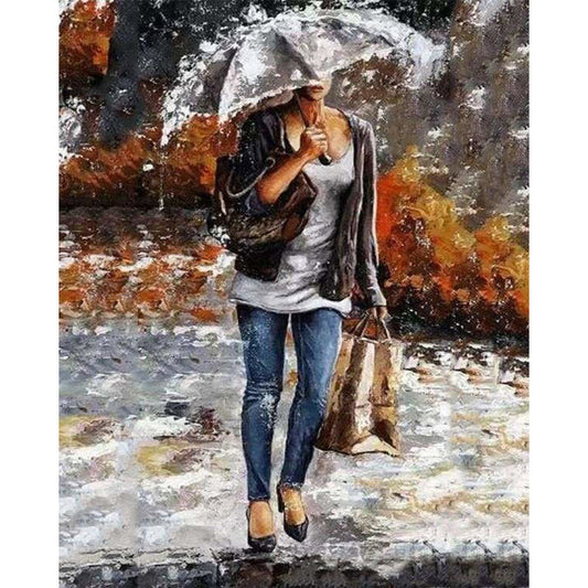 Woman carrying a bag in the Rain