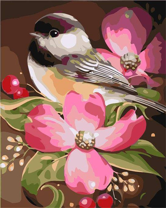 Niedlicher Vogel sitzt auf Blume